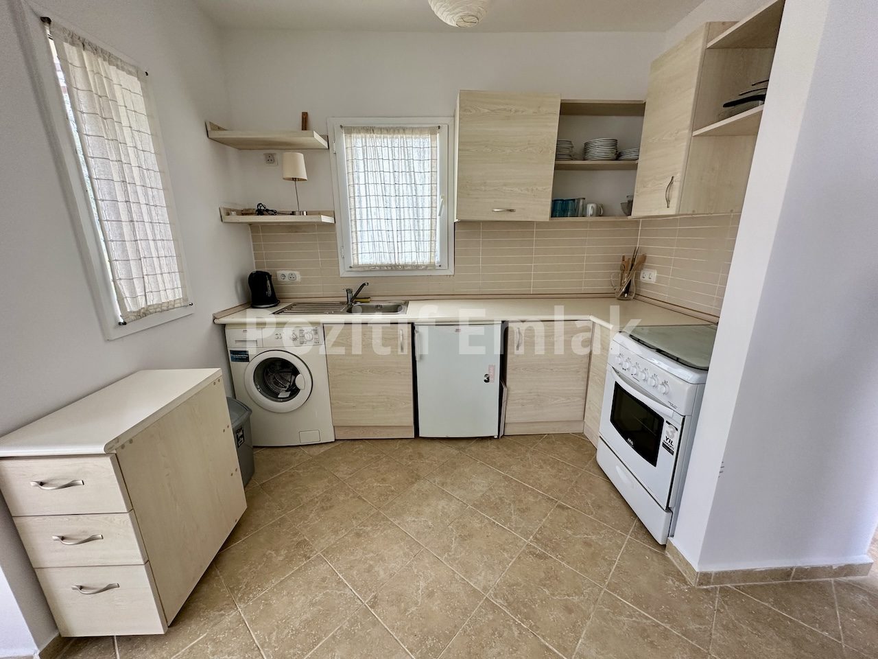 Gümüşlük'te Havuzlu Güvenlikli Sitede Manzaralı Ferah Daire