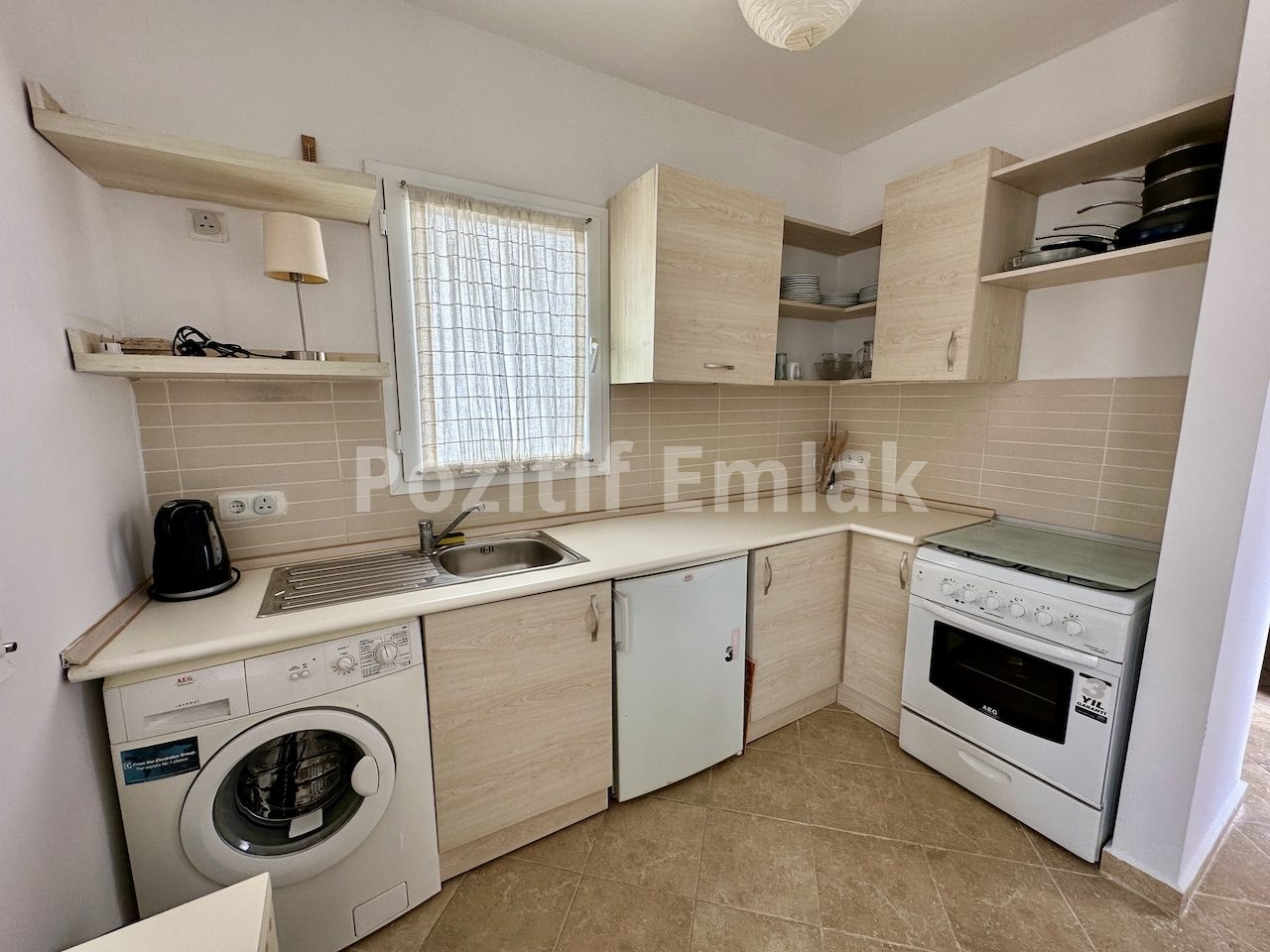 Gümüşlük'te Havuzlu Güvenlikli Sitede Manzaralı Ferah Daire