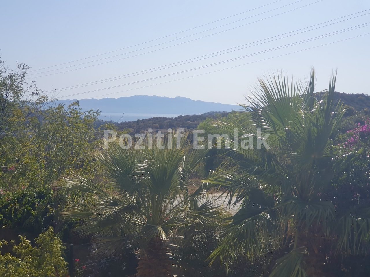 Gümüşlük'te Havuzlu Güvenlikli Sitede Manzaralı Ferah Daire