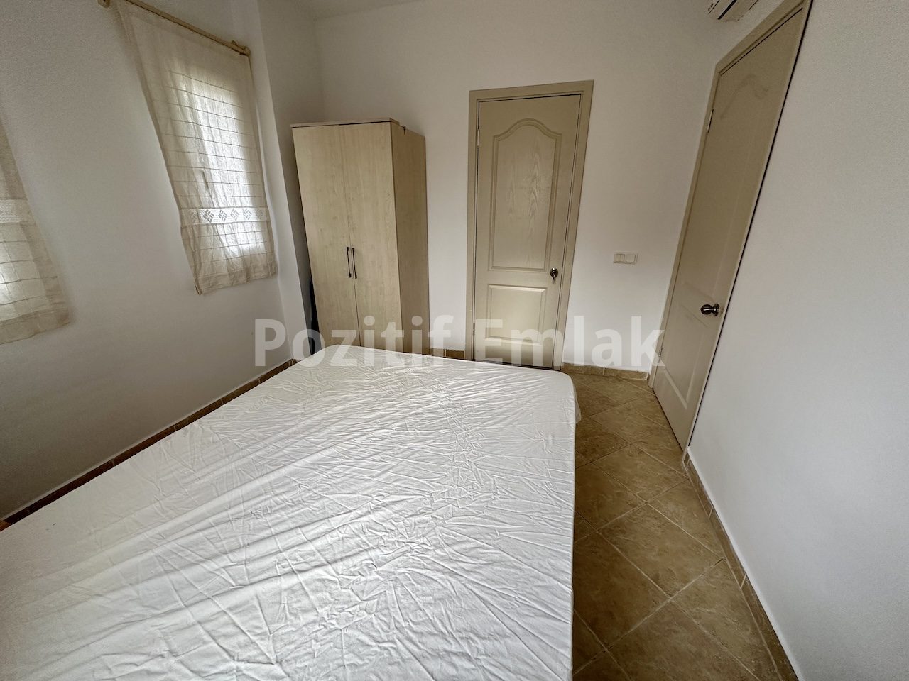 Gümüşlük'te Havuzlu Güvenlikli Sitede Manzaralı Ferah Daire