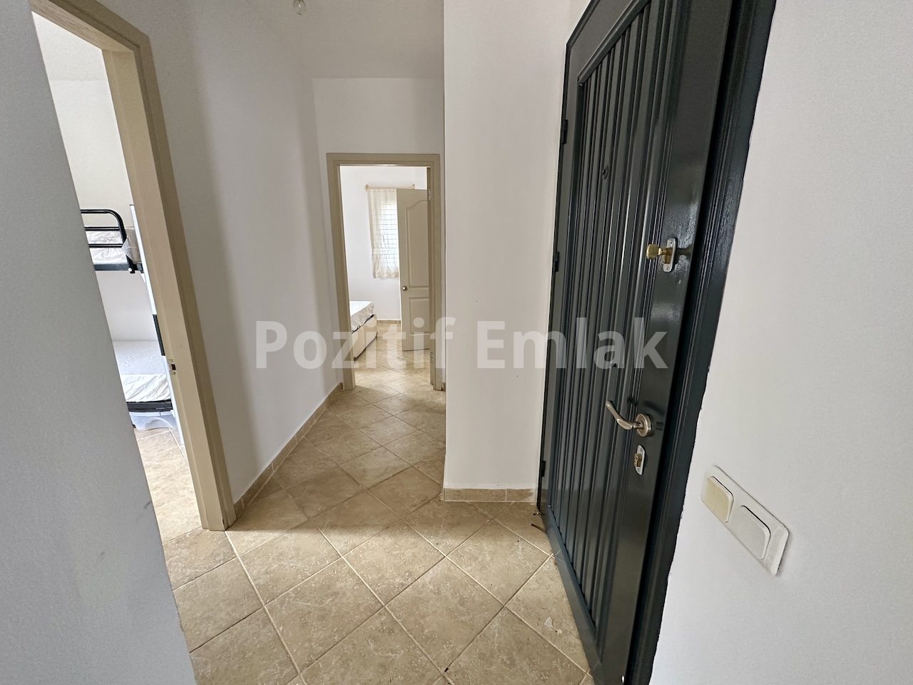 Gümüşlük'te Havuzlu Güvenlikli Sitede Manzaralı Ferah Daire